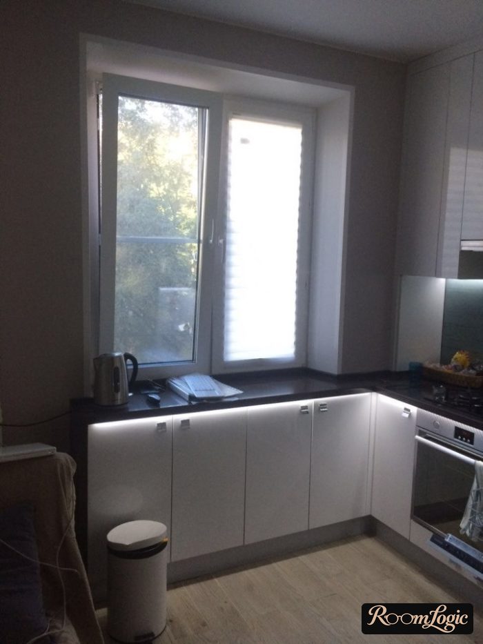 interesting kitchen idea with furniture by the window in a tiny apartment