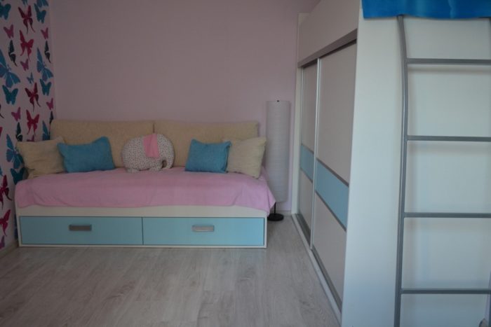 interior of a kids' room for two children of different genders