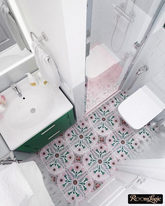interior of a small bathroom with a shower in light tones