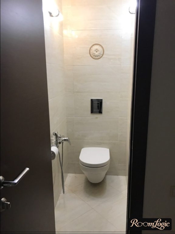 interior of a toilet in beige tones