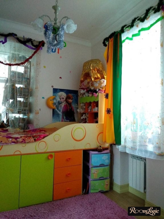 kids' room bed with a closet underneath