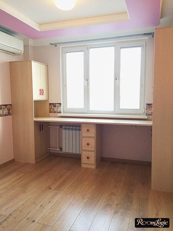 kids' room with a desk near the window