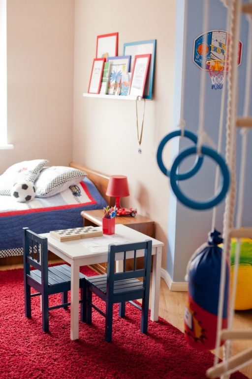 Children's table for two boys in the apartment interior children's room interior