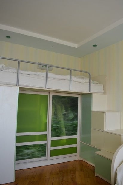 kids' zone in one room with parents