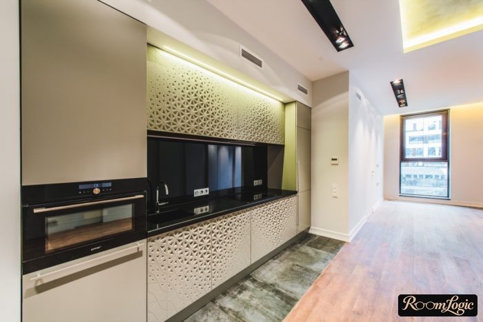kitchen area next to cabinets with one tile width