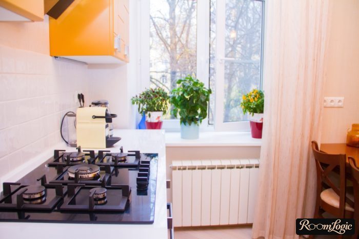 kitchen curtains on one side of the window