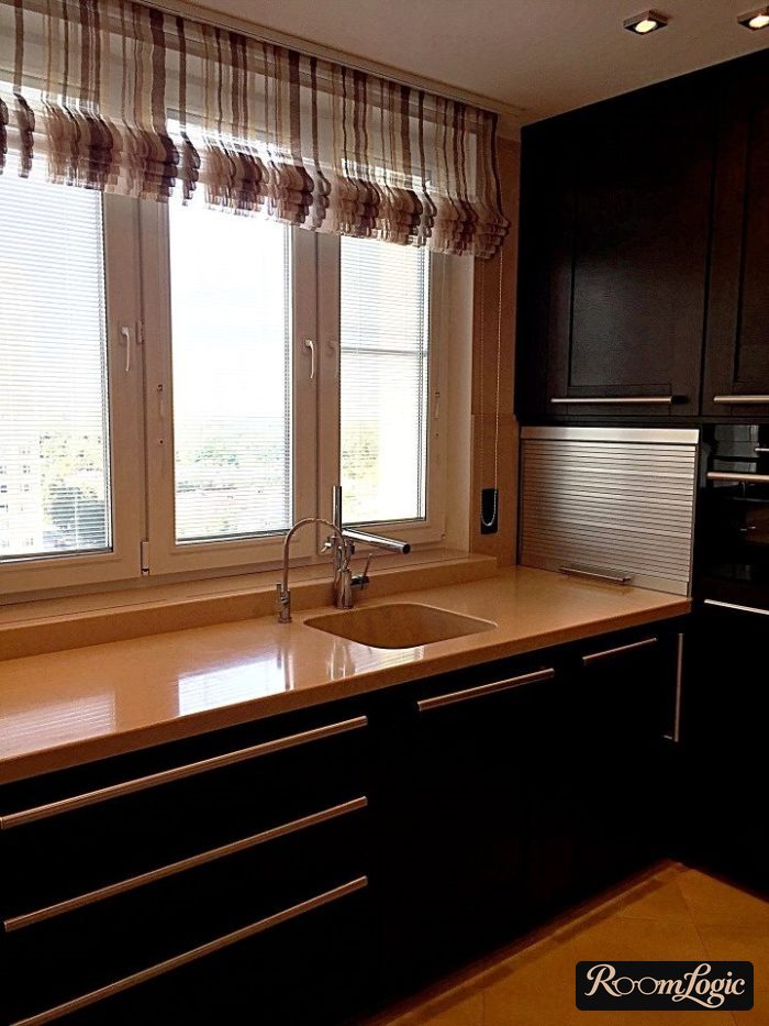 kitchen design with countertop by the window