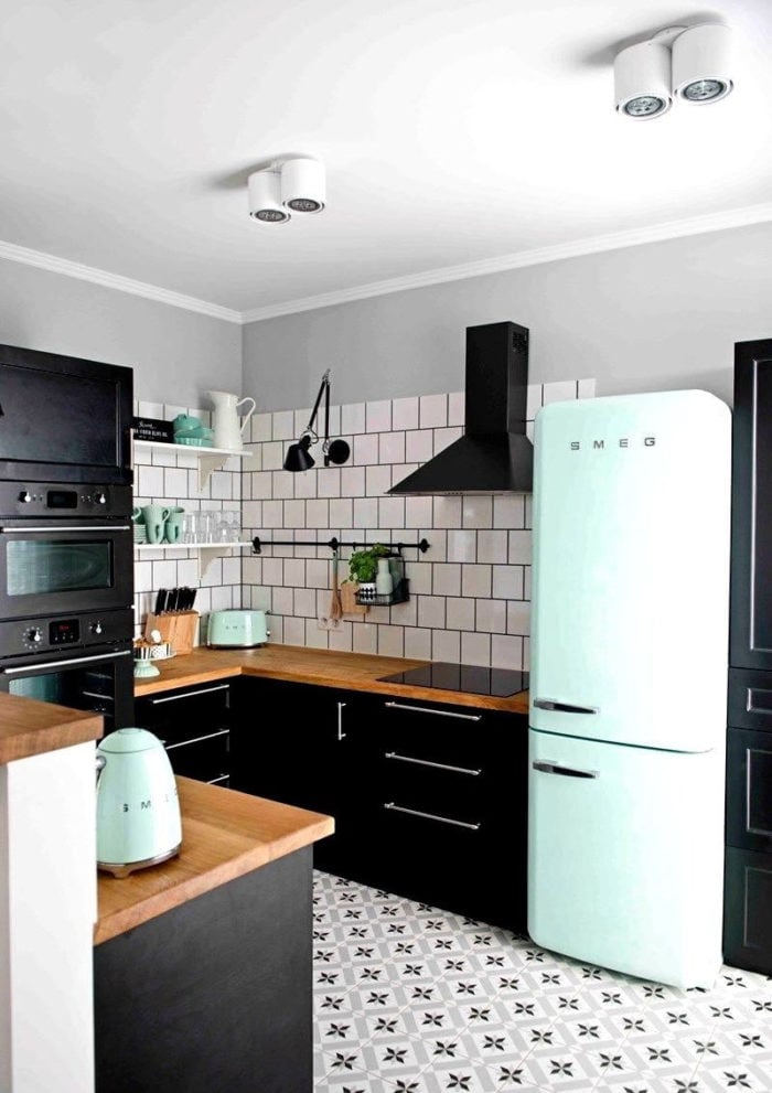 kitchen in scandi style without upper cabinets in apartment