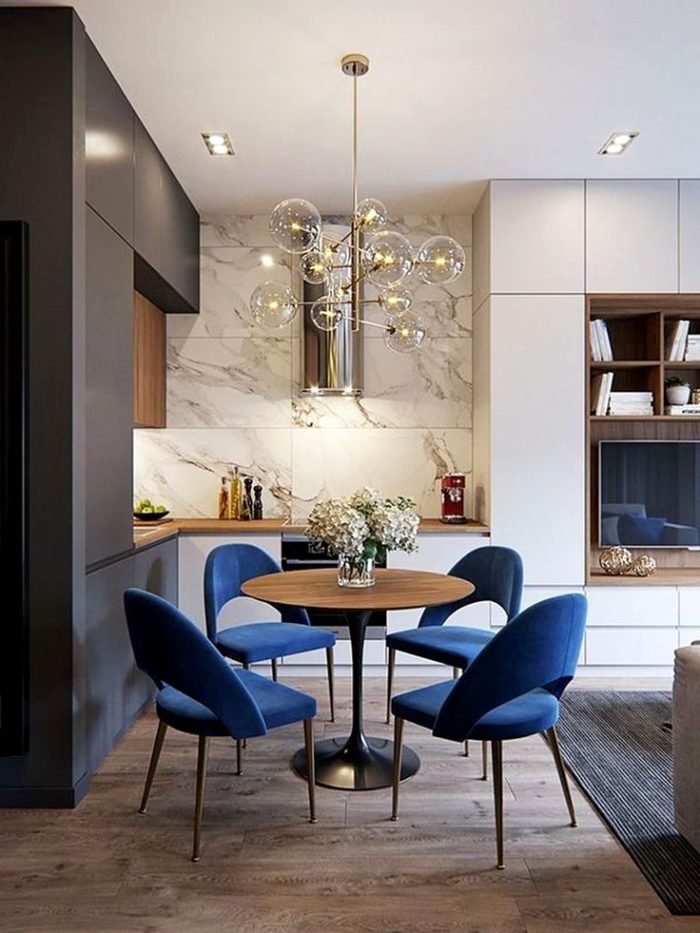 kitchen-living room in art deco style with blue chairs