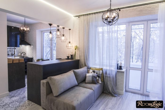 kitchen-living room with balcony and sheer curtain