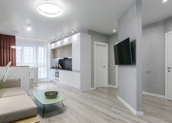 kitchen located on the 1st wall in studio apartment