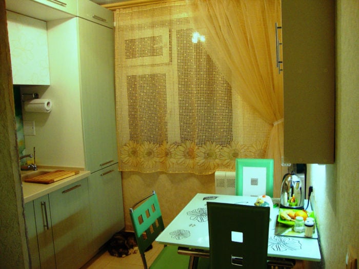 kitchen to the ceiling in a tiny apartment