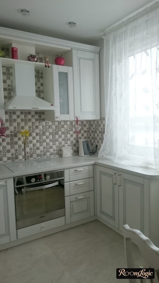 kitchen up to the ceiling in provence style in apartment