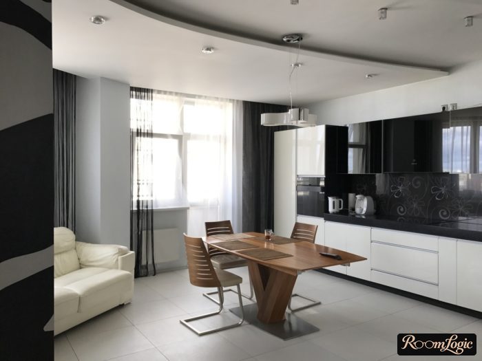 kitchen with balcony and curtains on hidden rod