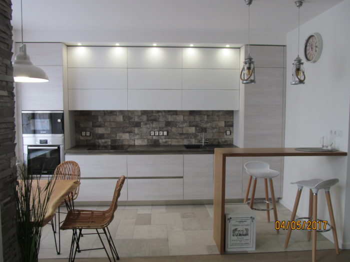 kitchen with bar counter made of solid oak