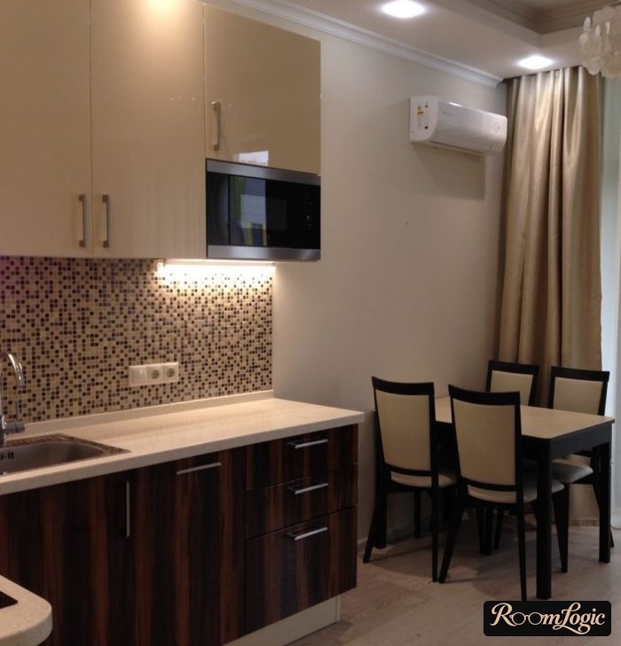 kitchen with beige curtains in light tones