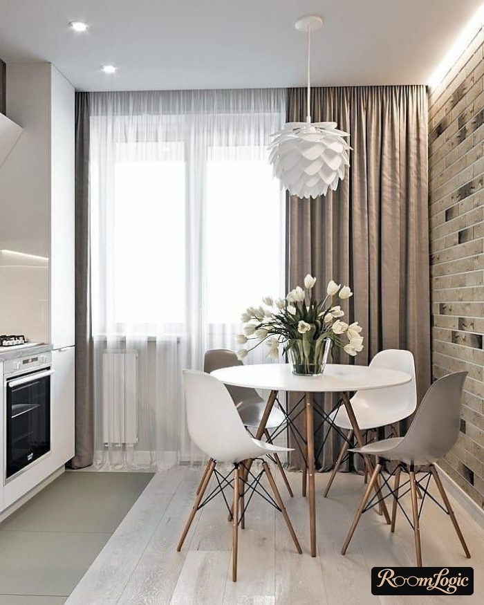kitchen with curtains of different lengths on opposite sides