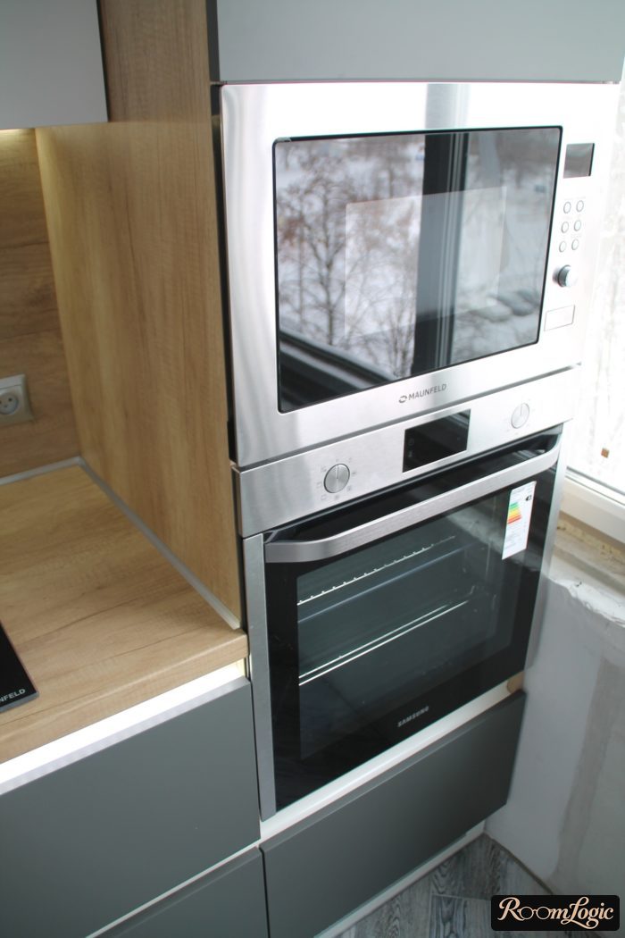 kitchen with gray refrigerator