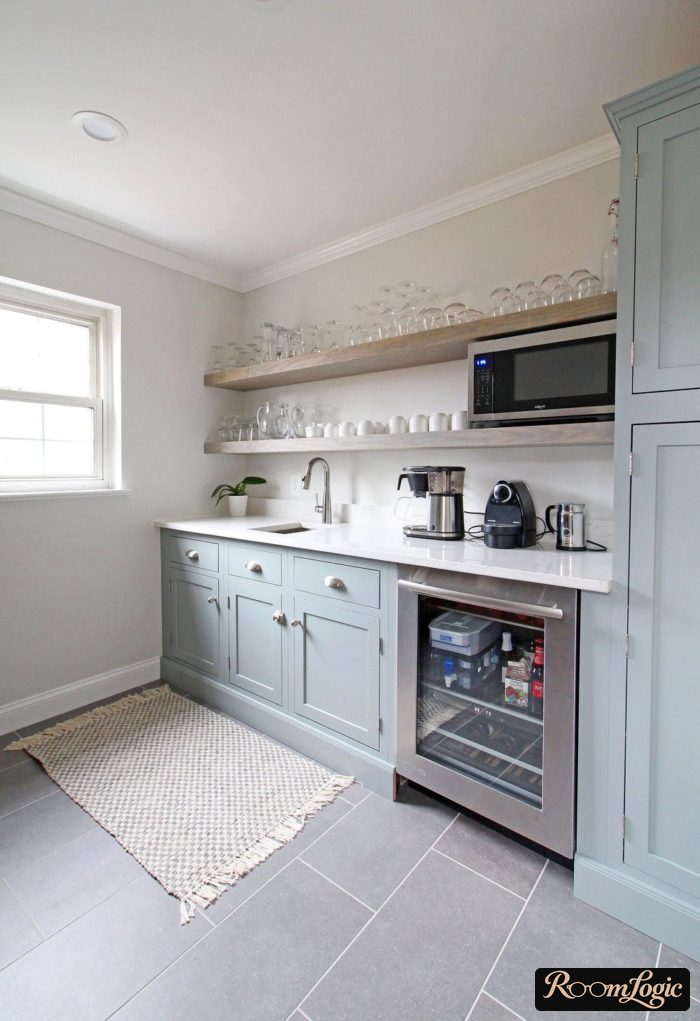kitchen with open shelves containing glasses
