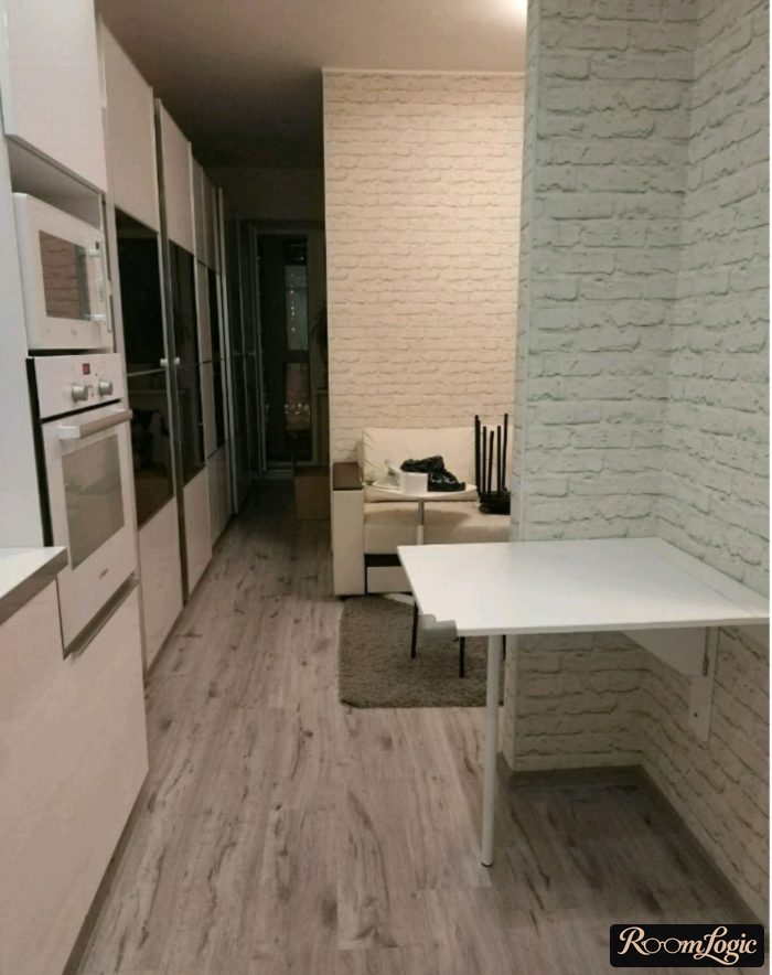 kitchen with white wallpaper imitating brick