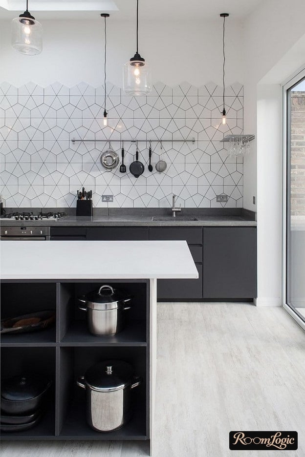 kitchen without upper cabinets with hexagonal tile on backsplash