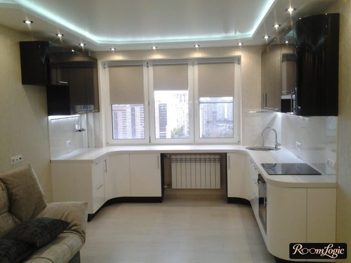 L-shaped kitchen with a window in the middle