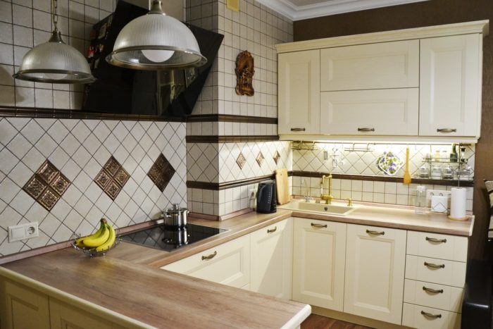 L-shaped kitchen with wooden countertop