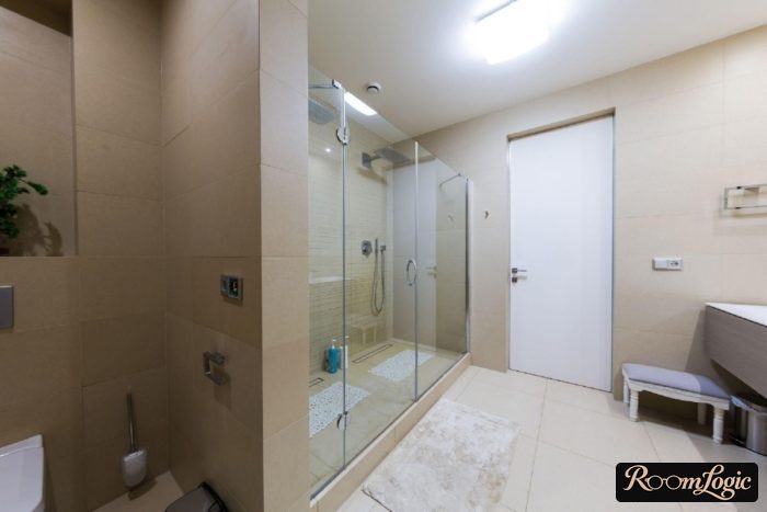 Large bathroom with a new expensive shower enclosure