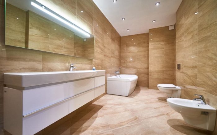 Large bathtub with marble-look tile