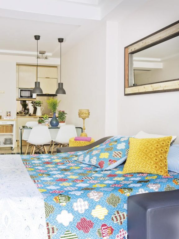 Large bed in a small studio apartment
