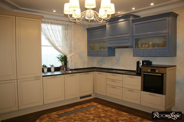 Large corner kitchen in Provence style