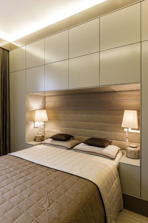 large wardrobe around the bed in the bedroom