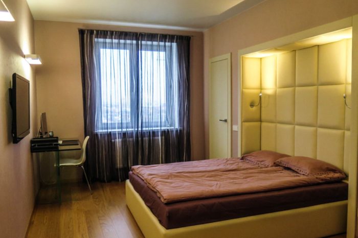 leather panels on the bedroom wall