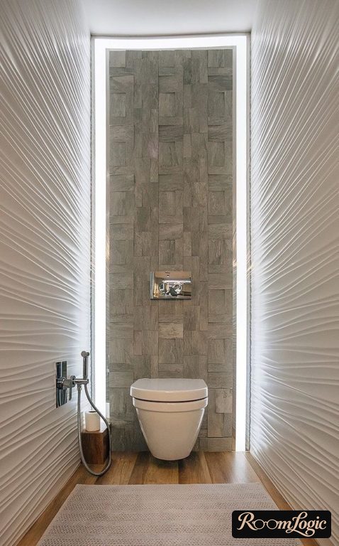 LED lighting on the wall behind the toilet