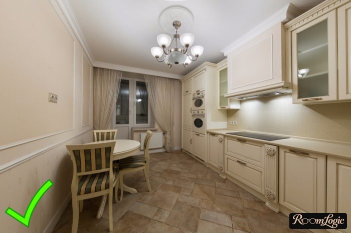 light apricot wallpaper in frames in a classic kitchen
