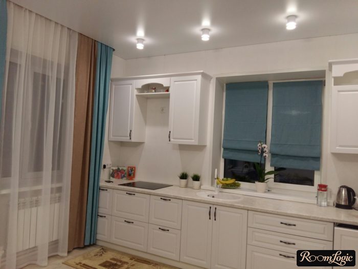 light blue and brown curtains on the kitchen balcony
