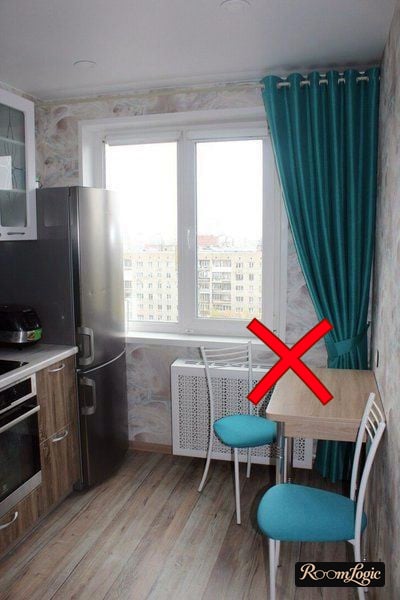 light blue curtains in the kitchen interior