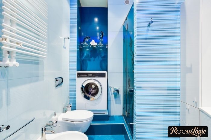 light blue tile in combined bathroom with washer