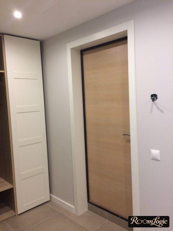 light gray wall finish in a small entryway