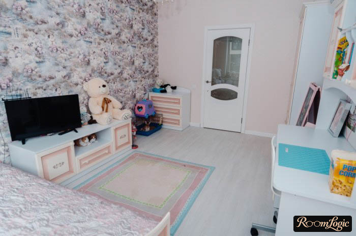 light interior of a kids' room with wallpaper