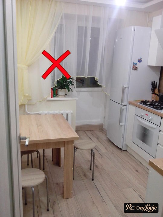 light short curtains on the kitchen with a balcony door