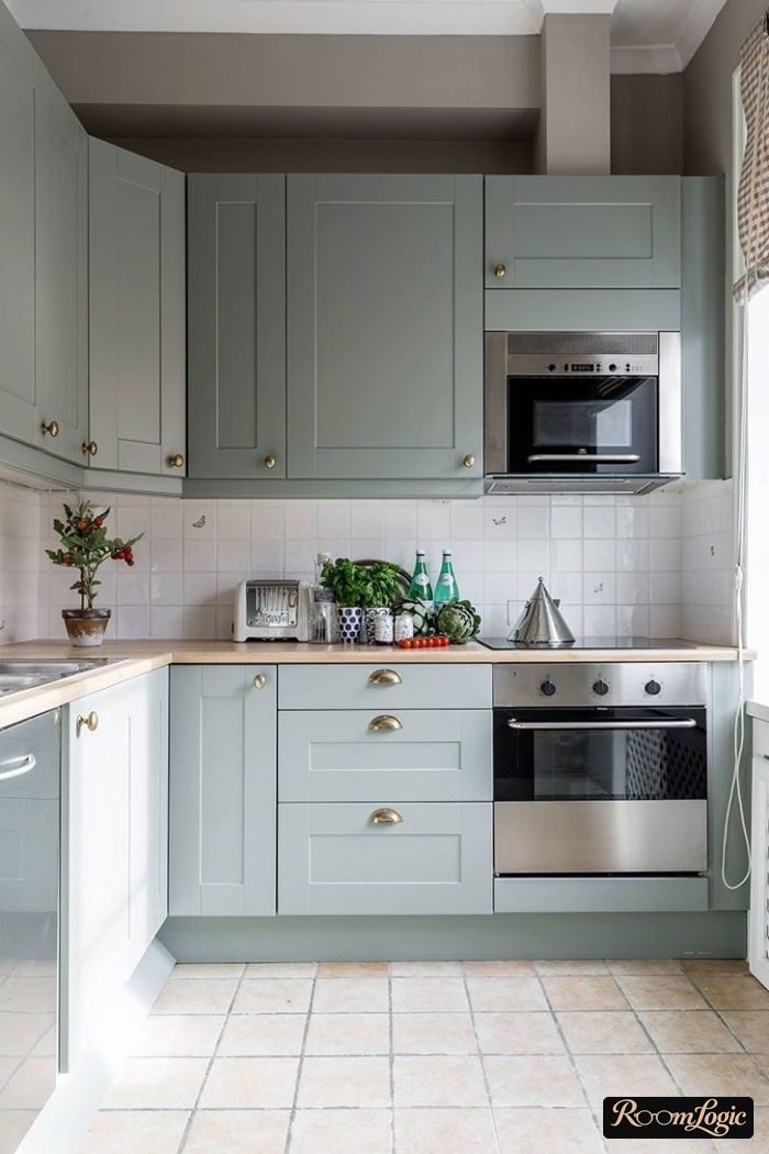Light turquoise kitchen in neoclassical style