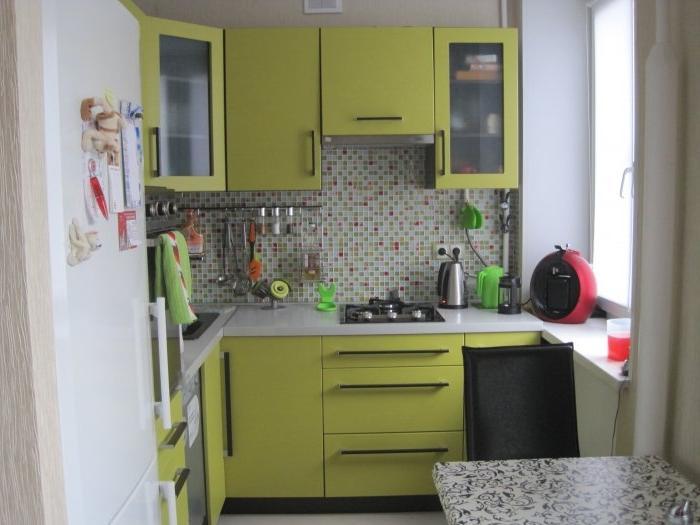 Lime green cabinet fronts in a small kitchen