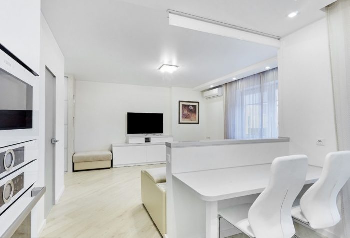 living room with a bar counter