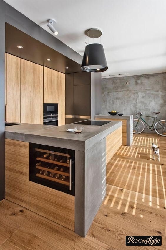 loft-style kitchen with thick concrete and wood countertop