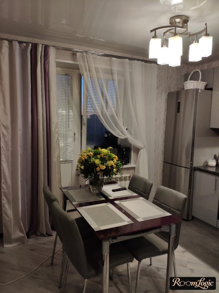 long curtains and tied sheer curtain on the kitchen with balcony door