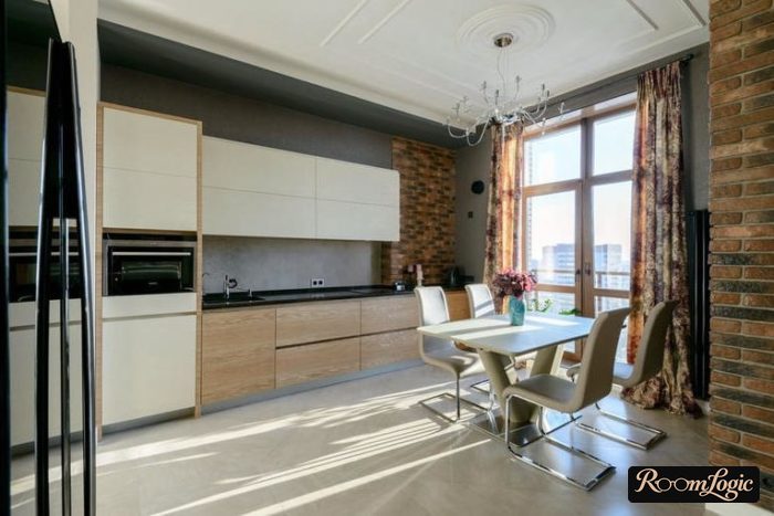 long curtains on a wall mount in the kitchen with a balcony door