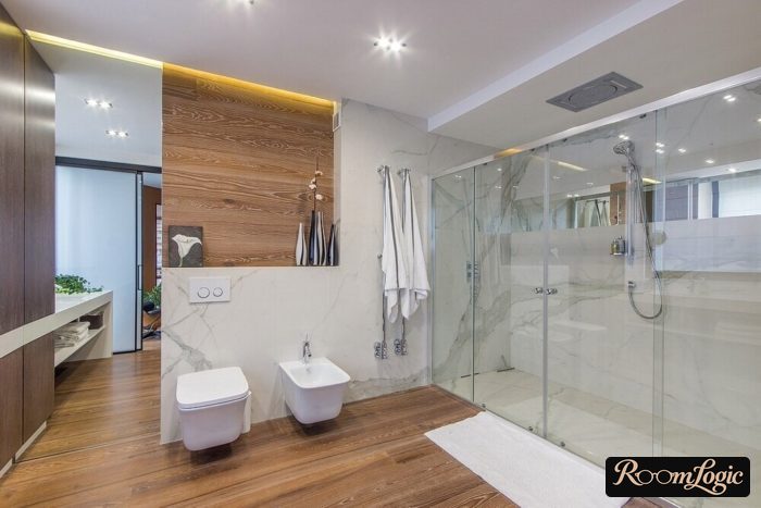 marble-look and wood tile in bathroom with shower