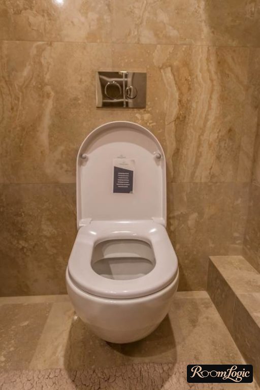marble-look tile in the toilet