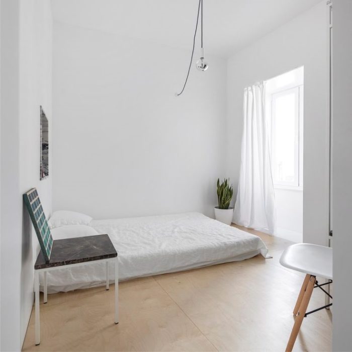 matress on floor in minimalist bedroom